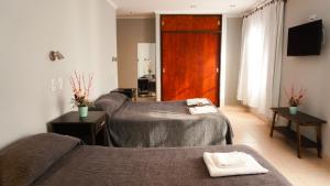 TV a/nebo společenská místnost v ubytování Hotel Maspalomas