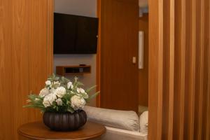 Photo de la galerie de l'établissement Eleganz Suítes Exclusive Centro, à Gramado