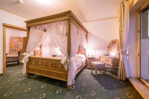 Postel nebo postele na pokoji v ubytování Hotel Diana