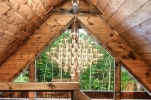 a chandelier hanging from the ceiling of a cabin at Romancing the Stone in Sevierville