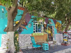 a building with a painting on the side of it at Playa Zen Rodadero in Rodadero +29 photos