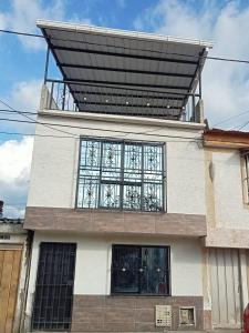 a building with a large window on top of it at la terraza in Armenia