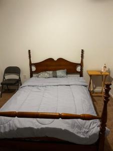 Ένα ή περισσότερα κρεβάτια σε δωμάτιο στο Cozy retreat room
