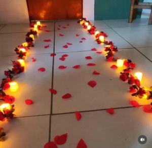a dance floor decorated with hearts and lights at Residência Tatiane canoa in Canoa Quebrada +108 photos