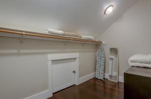 an empty room with a bed and a closet at Surfs Up Spacious Hood River Home - 30 Day Minimum Stay home in Hood River