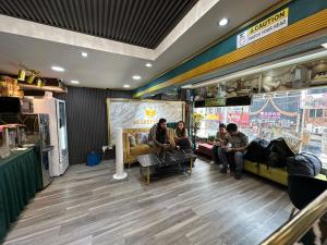 a group of people sitting in a store at SS Grey Hotel BBKL in Kuala Lumpur