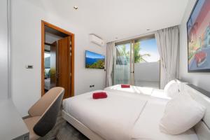 Giường trong phòng chung tại NEW! Luxury Villa 4 BR - Miami inspired design - Villa Piel +66 ảnh