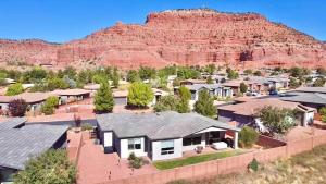 an aerial view of a home with a mountain in the background at Pet Friendly Southern Utah Luxury FamilyHome Views in Kanab