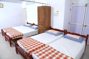 Postel nebo postele na pokoji v ubytování Lead Homestay