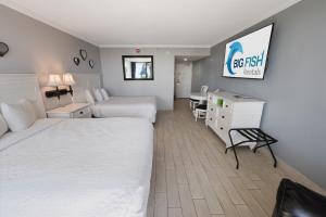 Postel nebo postele na pokoji v ubytování Renovated Oceanfront - Ground Floor - Great Pools! + 13 fotografií