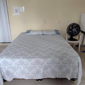 Ένα ή περισσότερα κρεβάτια σε δωμάτιο στο Suites Joao e Maria Quarto 04