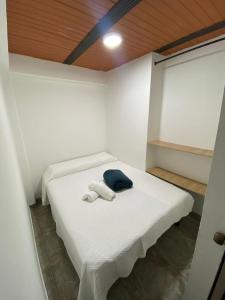 Ένα ή περισσότερα κρεβάτια σε δωμάτιο στο Casa la esquina