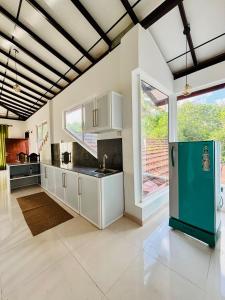 Kuchyň nebo kuchyňský kout v ubytování Meows homestay