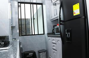 Η κουζίνα ή μικρή κουζίνα στο gA Luxury Apartment, 2 floors