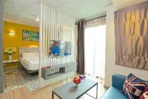 Ένα ή περισσότερα κρεβάτια σε δωμάτιο στο BB House Mini Suite Hotel