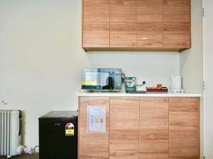 Køkken eller tekøkken på Lakeside Garden - Guest Room