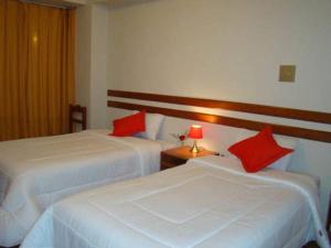 Letto o letti in una camera di Cusco House