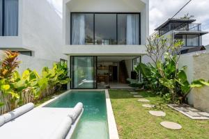 Κήπος έξω από το Lovely Nyanyi 2 - 2BR Private Pool Villa in Nyanyi Near Nuanu