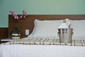 Postel nebo postele na pokoji v ubytování Hotel Saron
