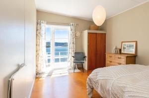 Ένα ή περισσότερα κρεβάτια σε δωμάτιο στο Waterfront Marlborough Sounds Retreat - 15min drive from Picton