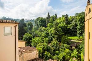 a view of a forest from a building at Apartment La Casina in Florence