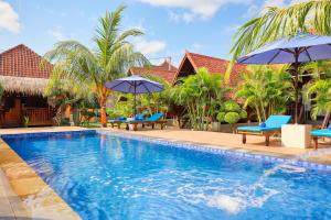 Swimmingpoolen hos eller tæt på Manyama Bungalow + 34 billeder