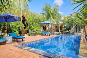 Swimmingpoolen hos eller tæt på Manyama Bungalow