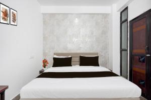 Katil atau katil-katil dalam bilik di Hotel O City Park Kota Formerly Oxyluxe