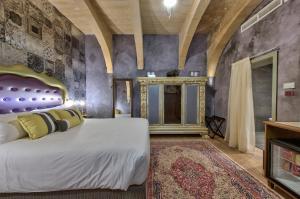 Postel nebo postele na pokoji v ubytování Palazzo Consiglia - IK Collection