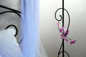 Posteľ alebo postele v izbe v ubytovaní Orizzonte Apartments Lefkada