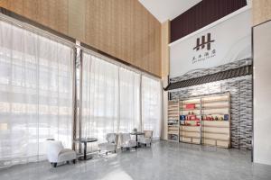 Φωτογραφία από το άλμπουμ του Lanfeng Hotel Guangzhou Zengcheng Xintang Station Subway Station Branch σε Zhongtang