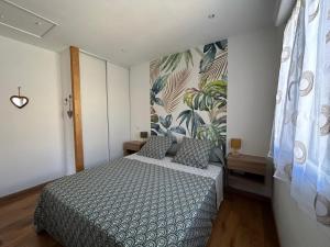 Ένα ή περισσότερα κρεβάτια σε δωμάτιο στο Gîte de la Trémiére