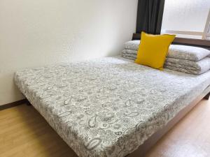 Una cama o camas en una habitación de DP House