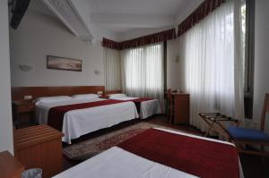 Katil atau katil-katil dalam bilik di Pension Alameda