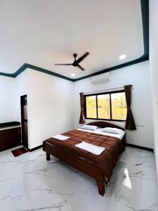 Postel nebo postele na pokoji v ubytování Roadway Inn