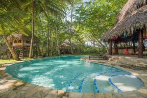 Bazén v ubytování Natura Cabana Boutique Hotel & SPA by Mint nebo v jeho okolí