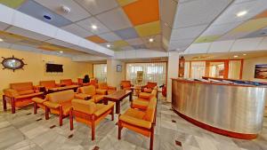 A television and/or entertainment centre at Hotel Exotica