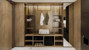 a room with a closet with a appliance in it at Oakwood Yogyakarta in Jetis