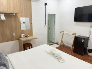 Postel nebo postele na pokoji v ubytování Three COCO Villa