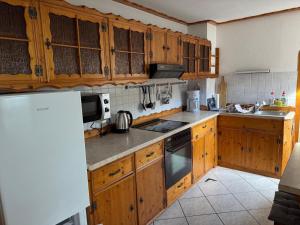 Η κουζίνα ή μικρή κουζίνα στο Hagemann Querfurter Straße 13