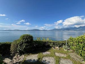 a view of a large body of water at Studio avec accès direct au lac de Geneve in Saint-Gingolph