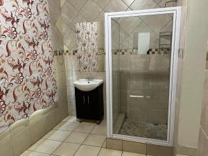 Koupelna v ubytování Zonke Bonke Guest House Lydenburg