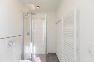 Ένα μπάνιο στο Apartmenthaus vor den Halligen Deichidyll de Luxe