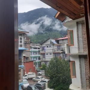 a view from a window of a city at Potala Hotel in Jāmb +6 photos