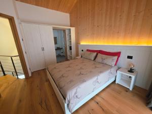 En eller flere senge i et værelse på Ciasa Fatati'