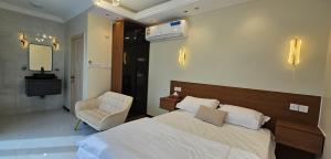 Postel nebo postele na pokoji v ubytování Blue Dome Chalet شاليه القبة الزرقاء