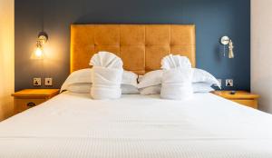 Giường trong phòng chung tại Angrove