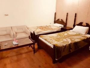 Ένα ή περισσότερα κρεβάτια σε δωμάτιο στο Deego hotel