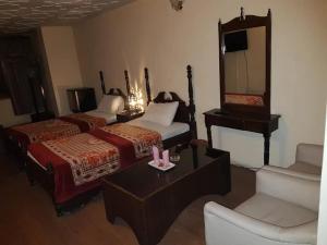 Ένα ή περισσότερα κρεβάτια σε δωμάτιο στο Deego hotel