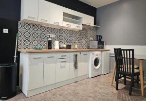 Η κουζίνα ή μικρή κουζίνα στο Studio Jean Jaurès - centre ville, Détente&Elégance